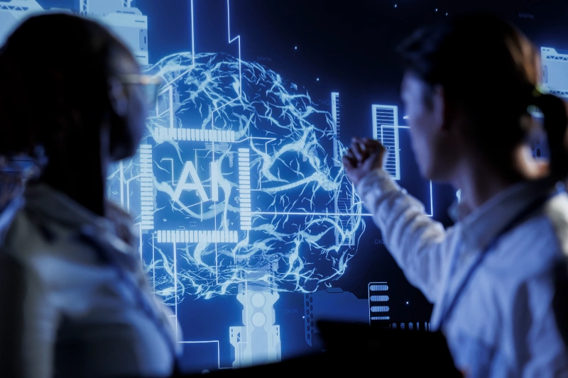 Ingenieros analizando aplicaciones de IA en trading